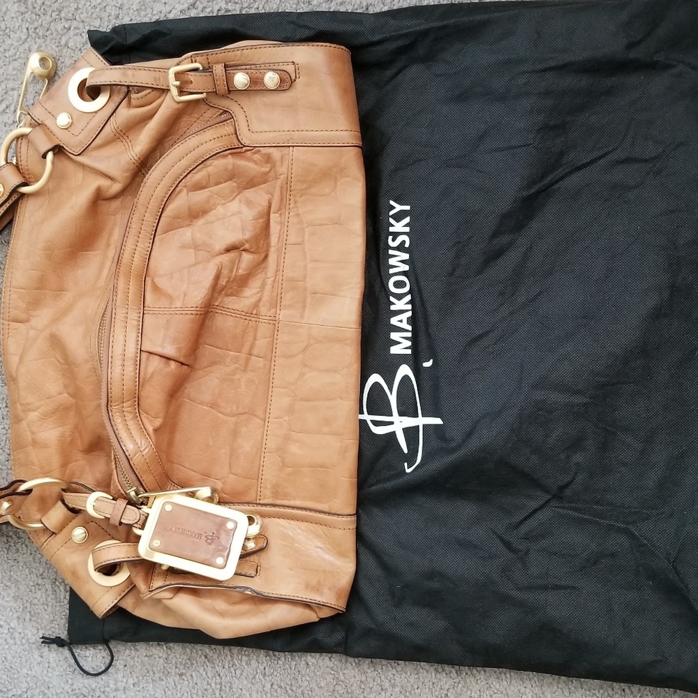 Embossed satchel